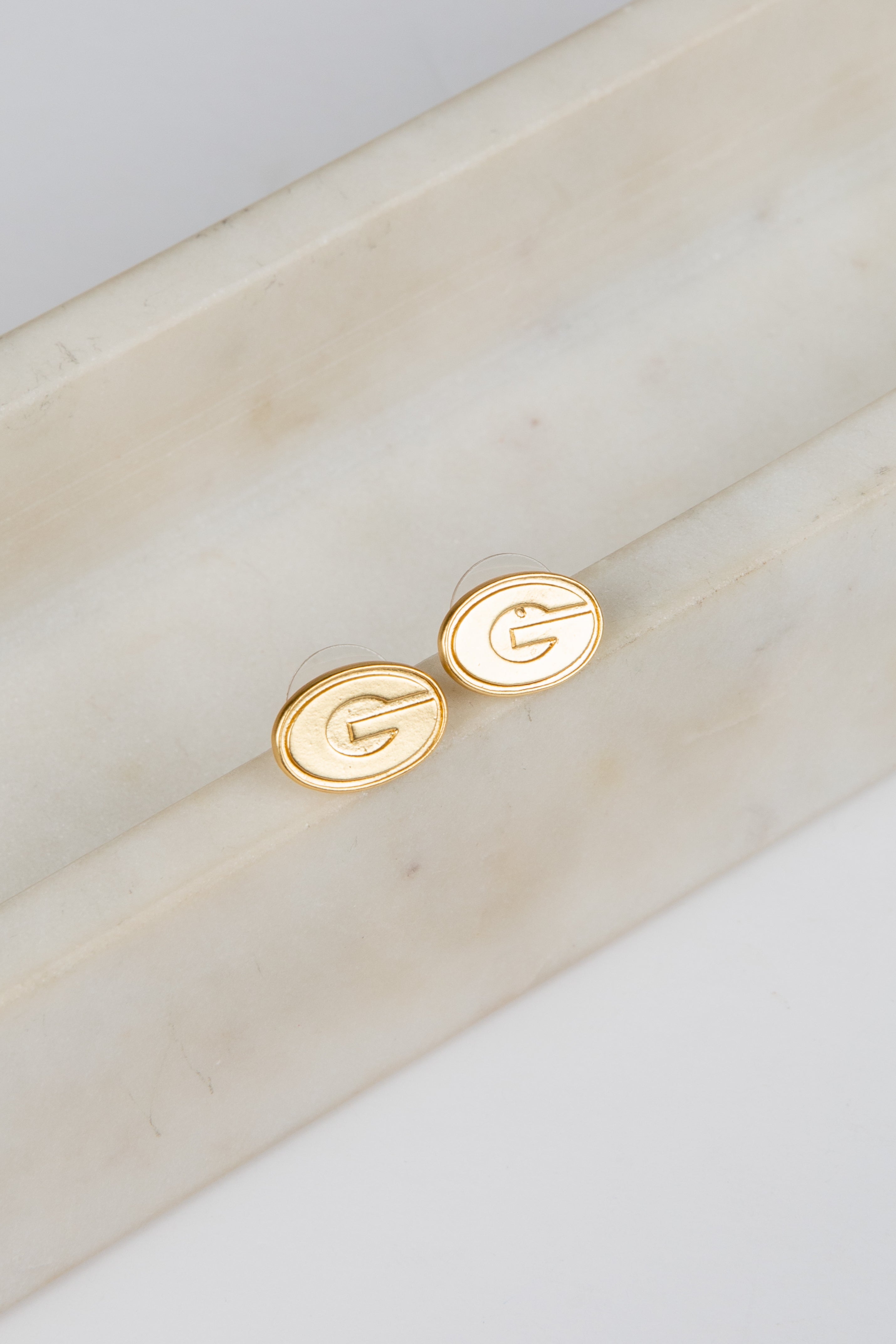 Gold earrings with &