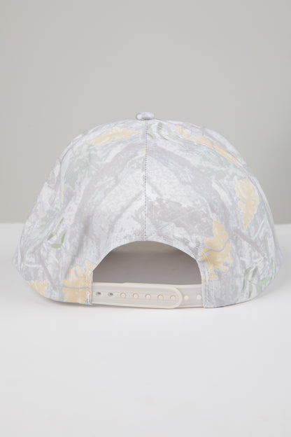 Marbled patterned cap on a light gray background