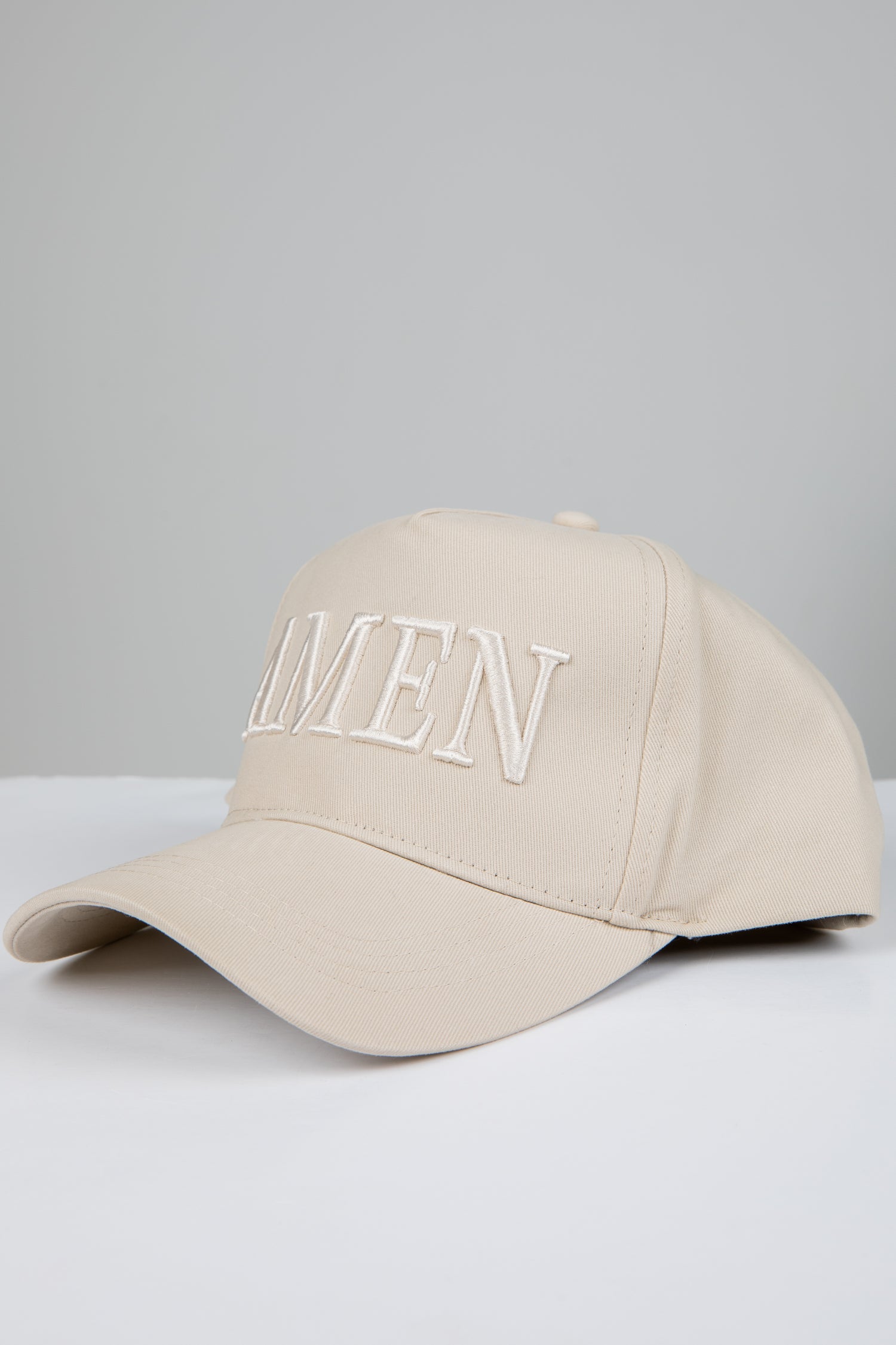 Beige cap with &