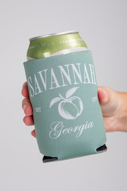 Can with a green sleeve displaying &