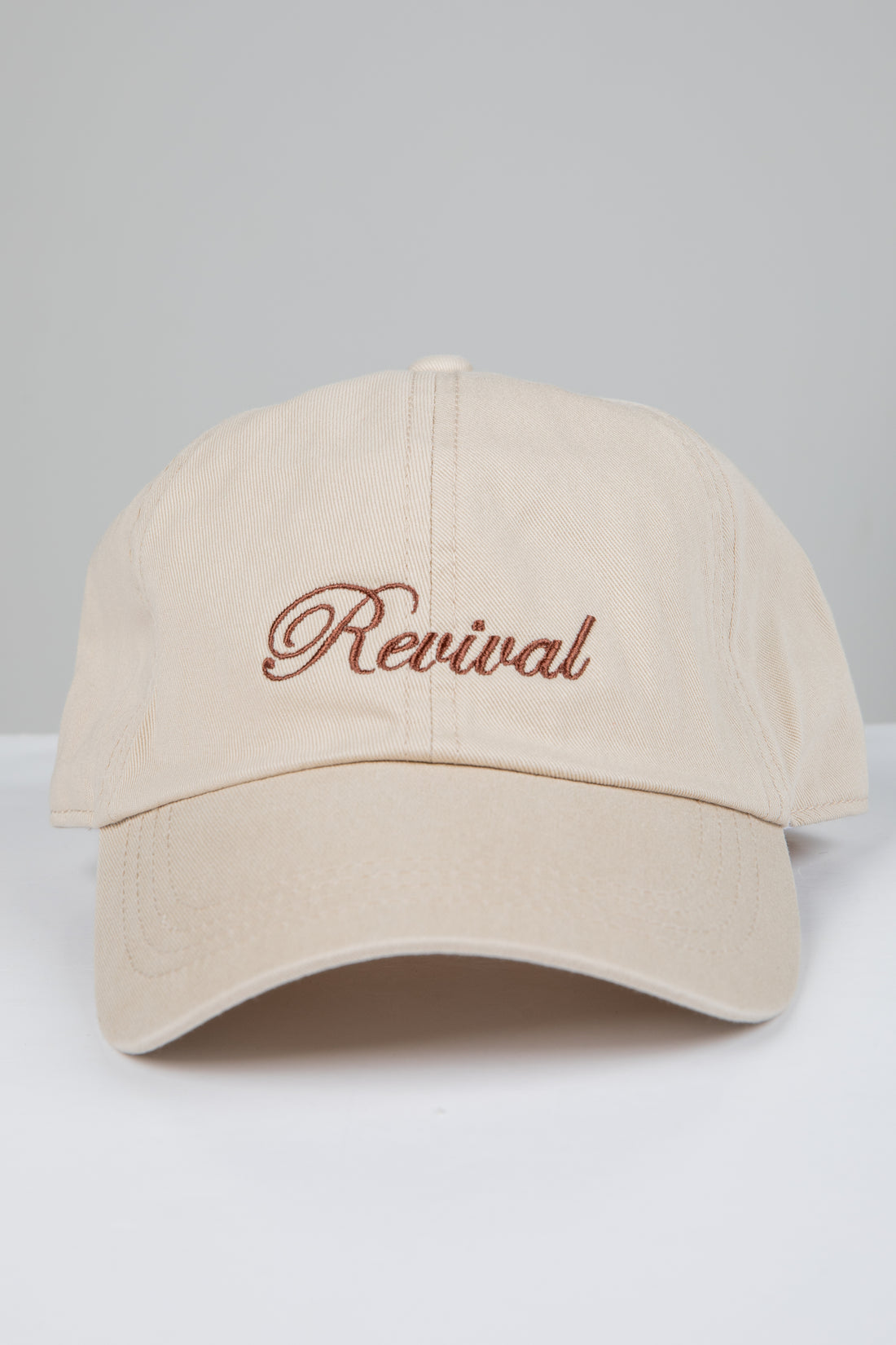 Beige cap with &