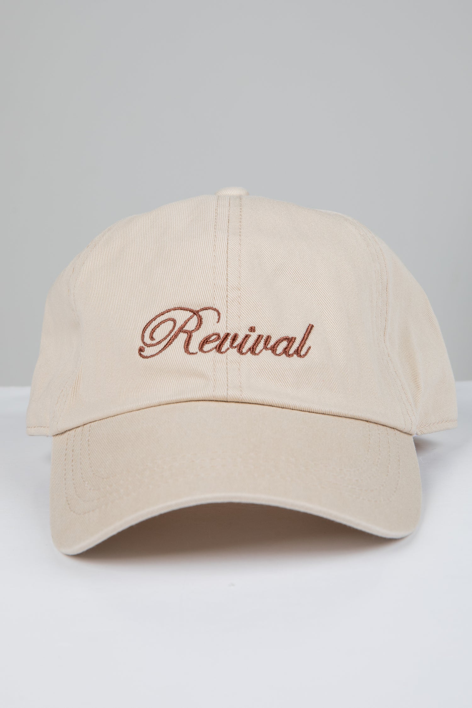 Beige cap with &