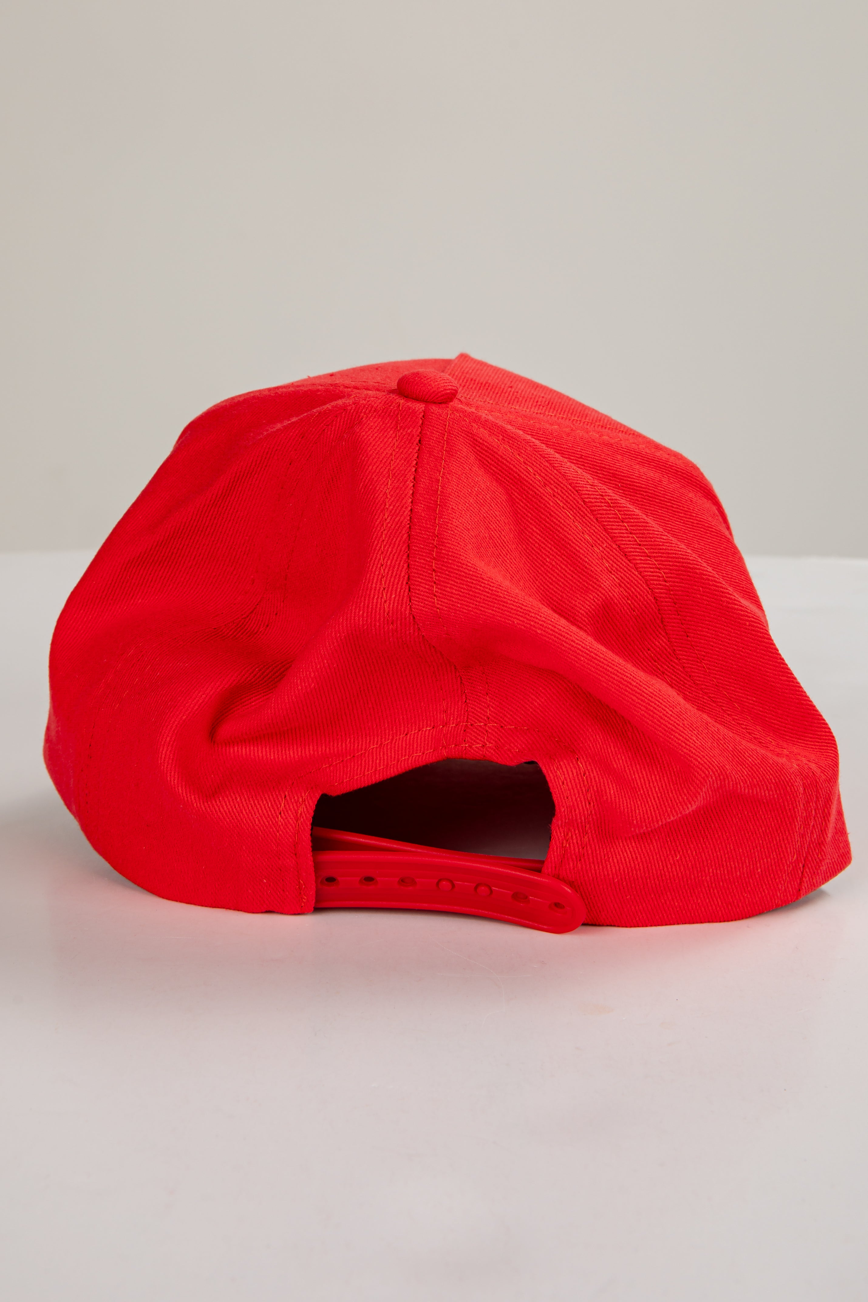 Red cap on a light gray background