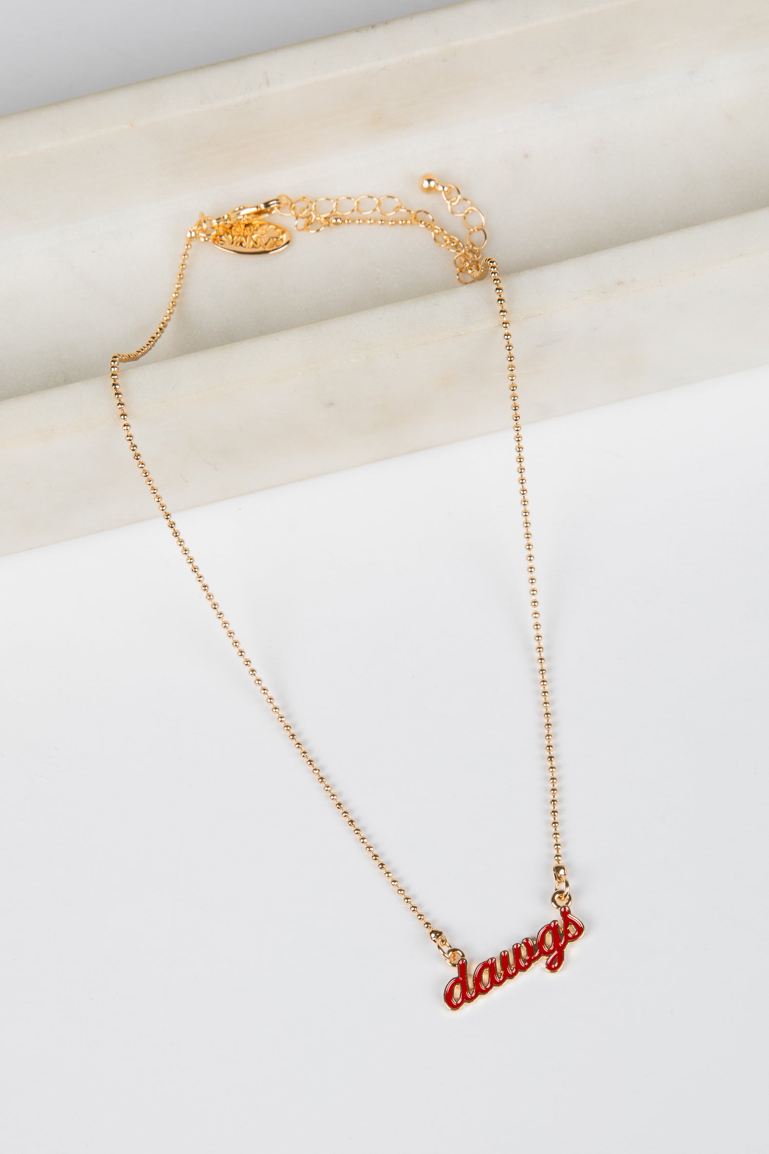 Gold necklace with red &