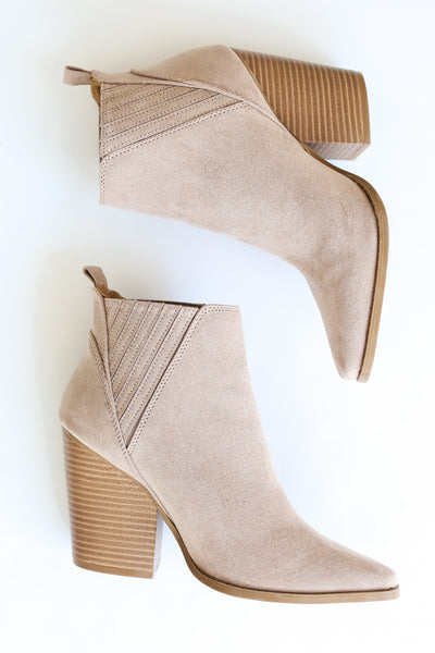 taupe suede Booties flat lay