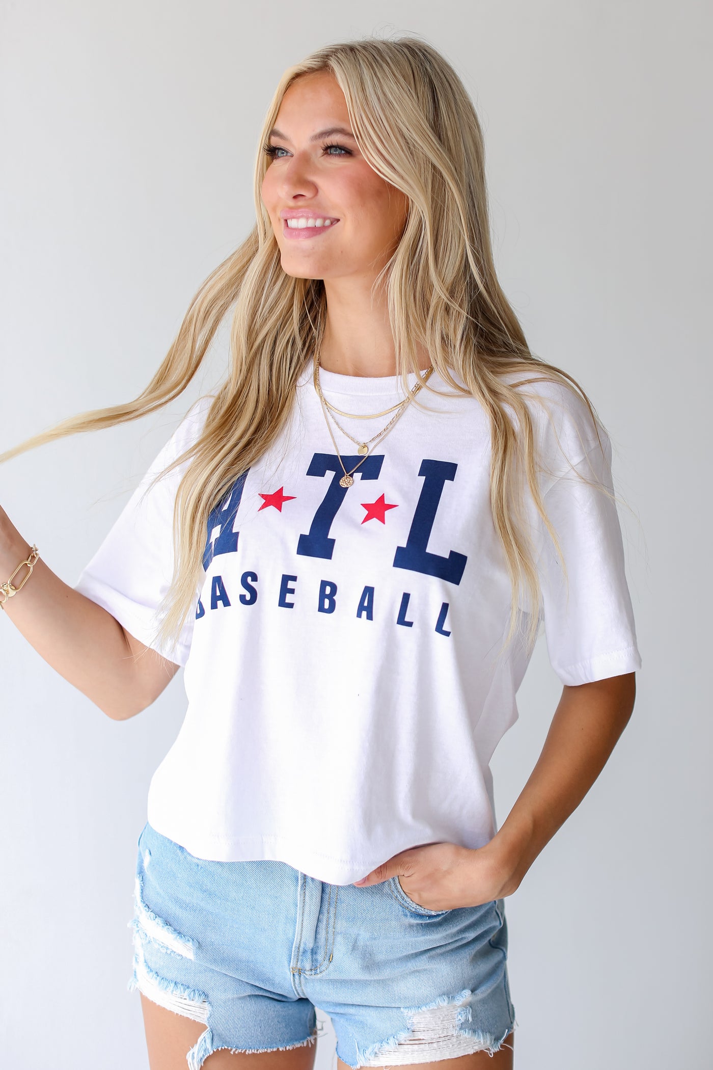 White ATL Star Baseball Cropped Tee on dress up model
