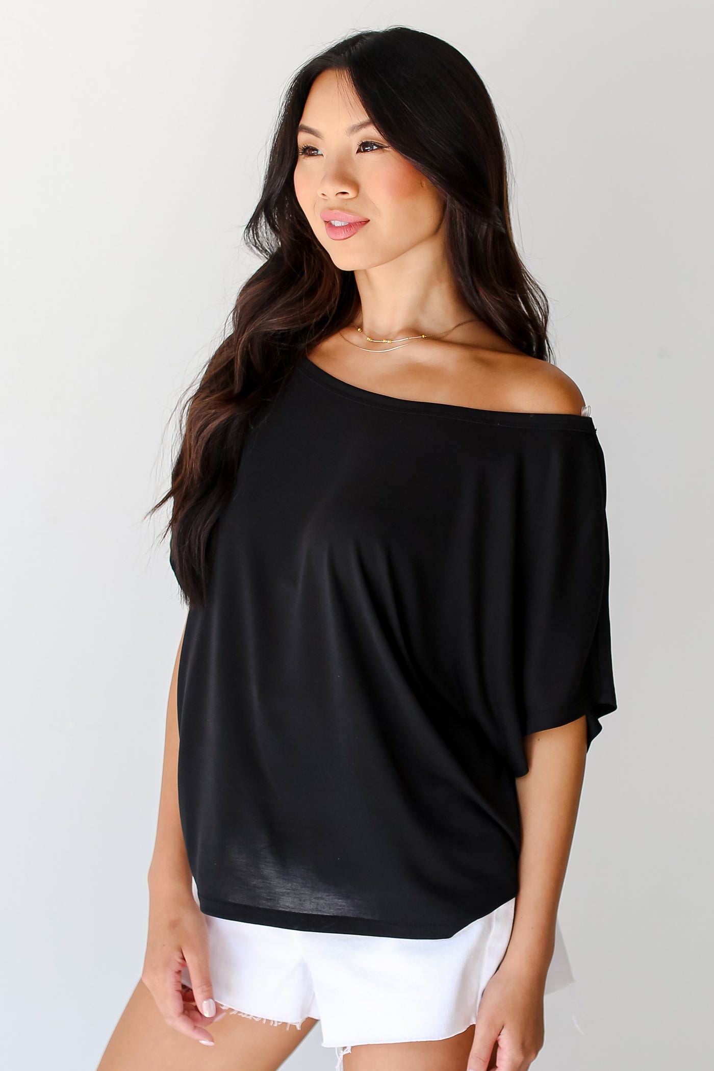 black Off-The-Shoulder Tee side view