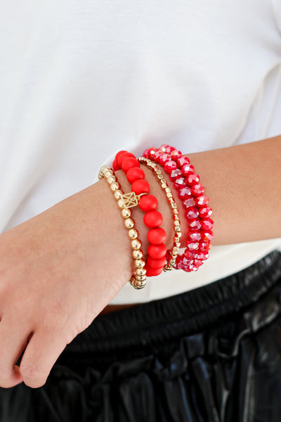 Red + Gold Beaded Bracelet Set on model