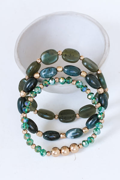 green Beaded Bracelet Set flat lay