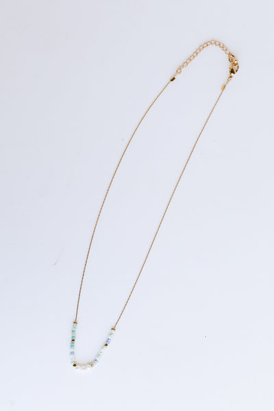 blue Beaded Necklace flat lay