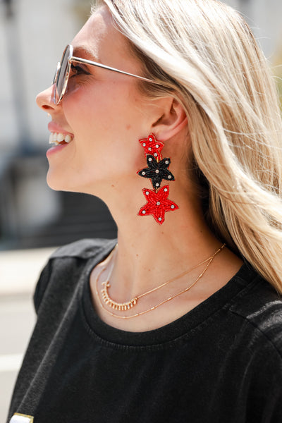 Red + Black Beaded Star Drop Earrings close up