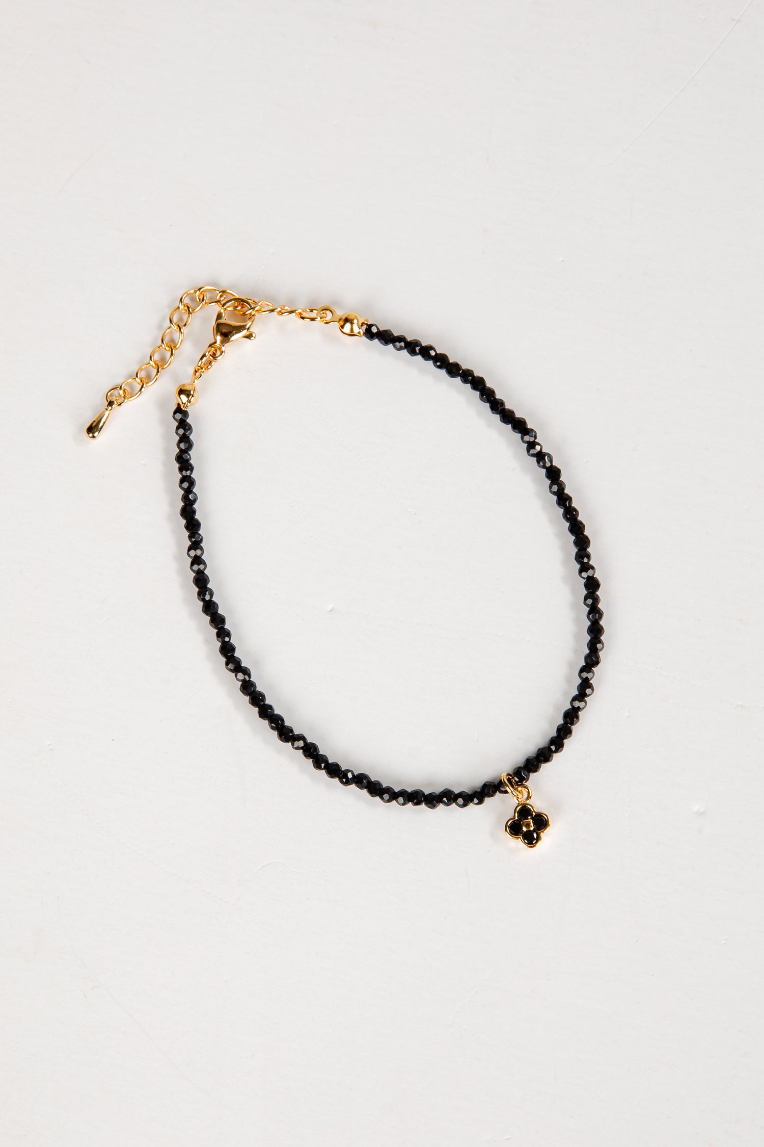 Black Beaded Quatrefoil Charm Bracelet | Cute Bracelets | DressUp Black Beaded Quatrefoil Charm Bracelet | Cute Bracelets | DressUp