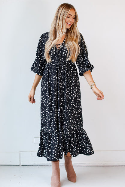 model wearing a Black Floral Maxi Dress