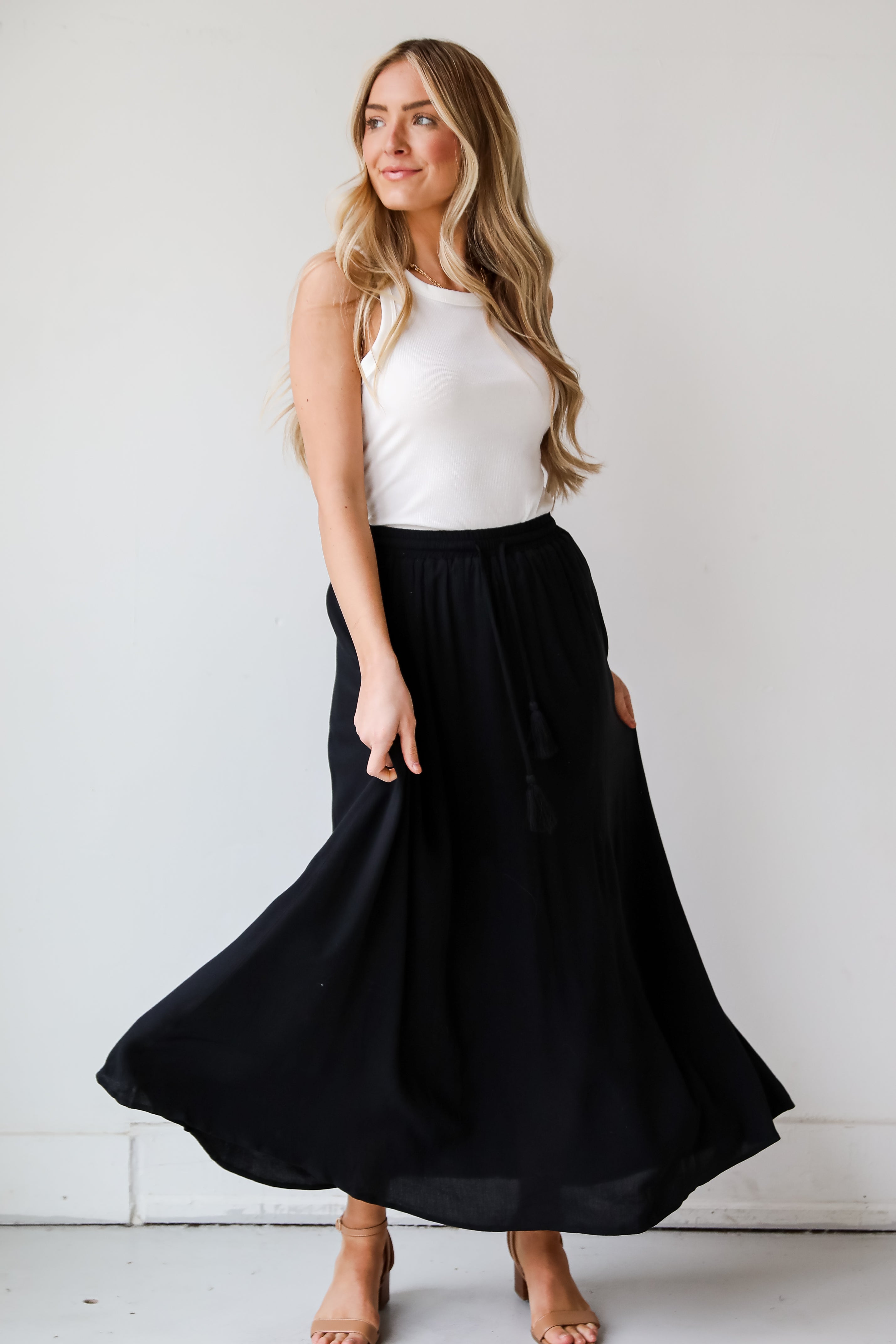 Long black flowy maxi skirt hotsell