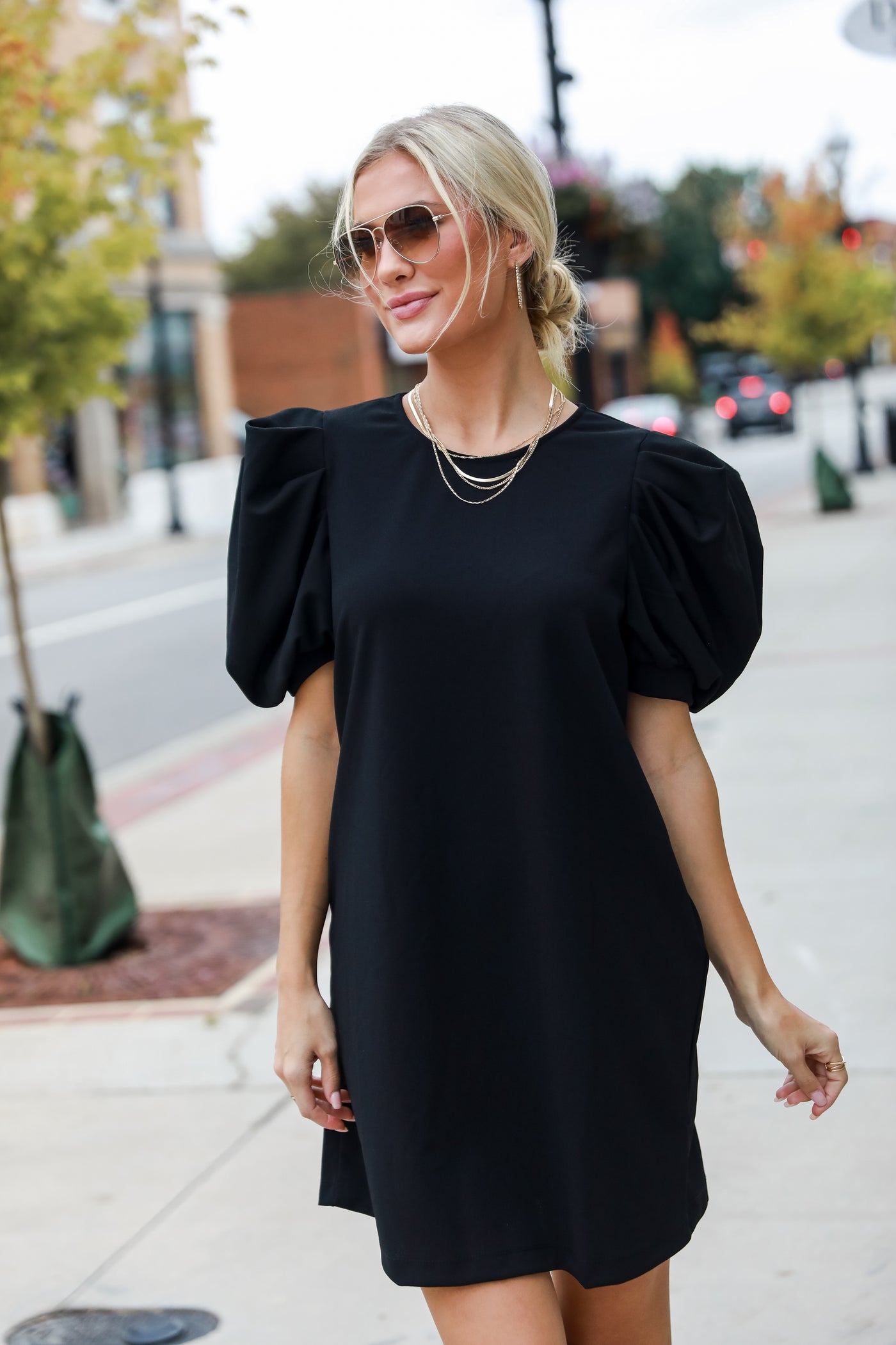 black Puff Sleeve Mini Dress on model