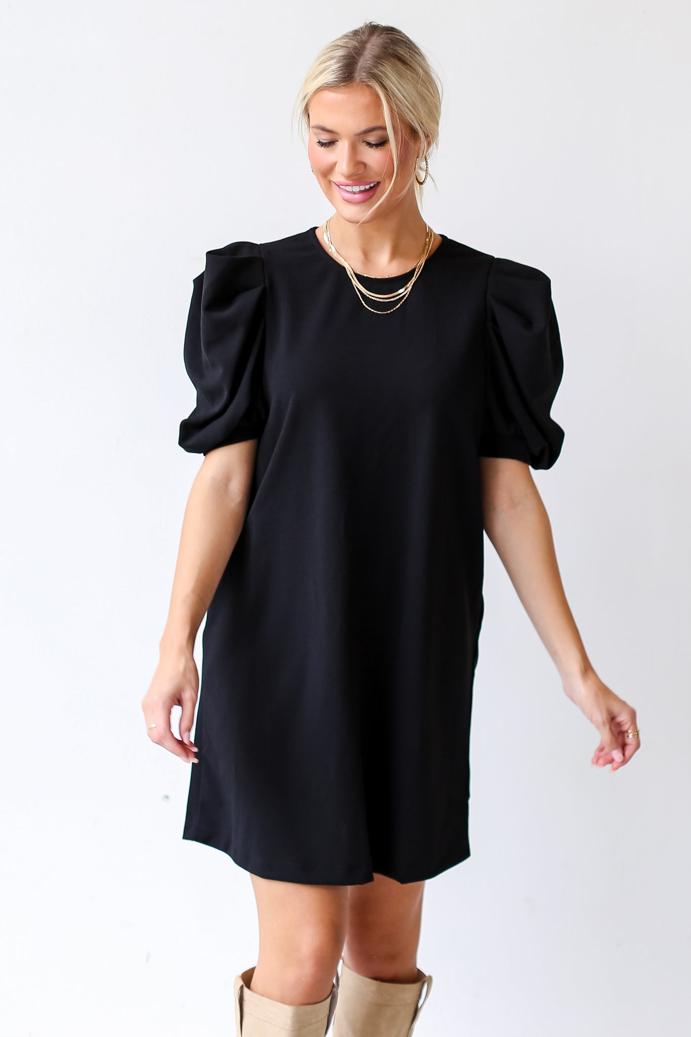dress up model wearing a black Puff Sleeve Mini Dress