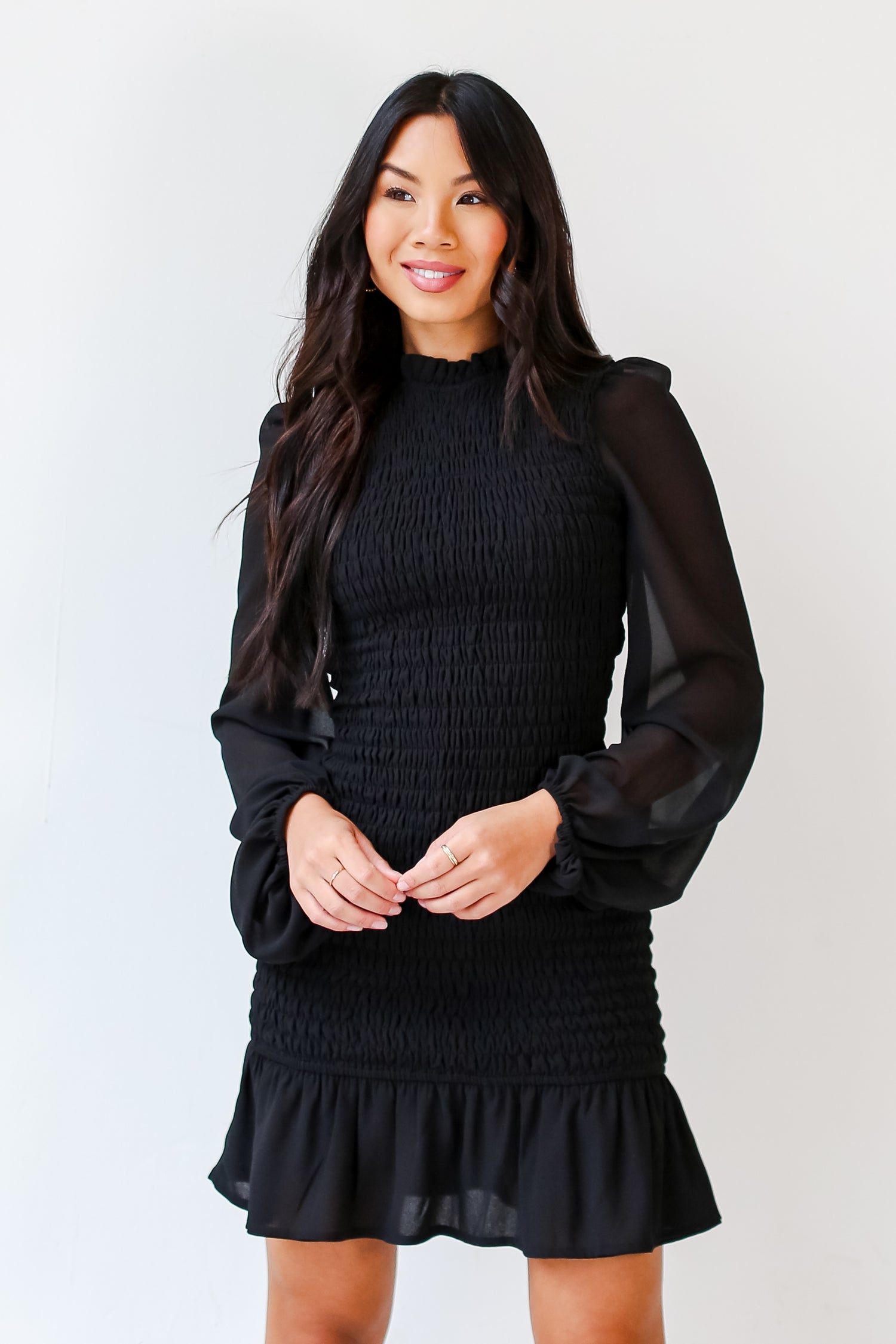 black Smocked Mini Dress on model