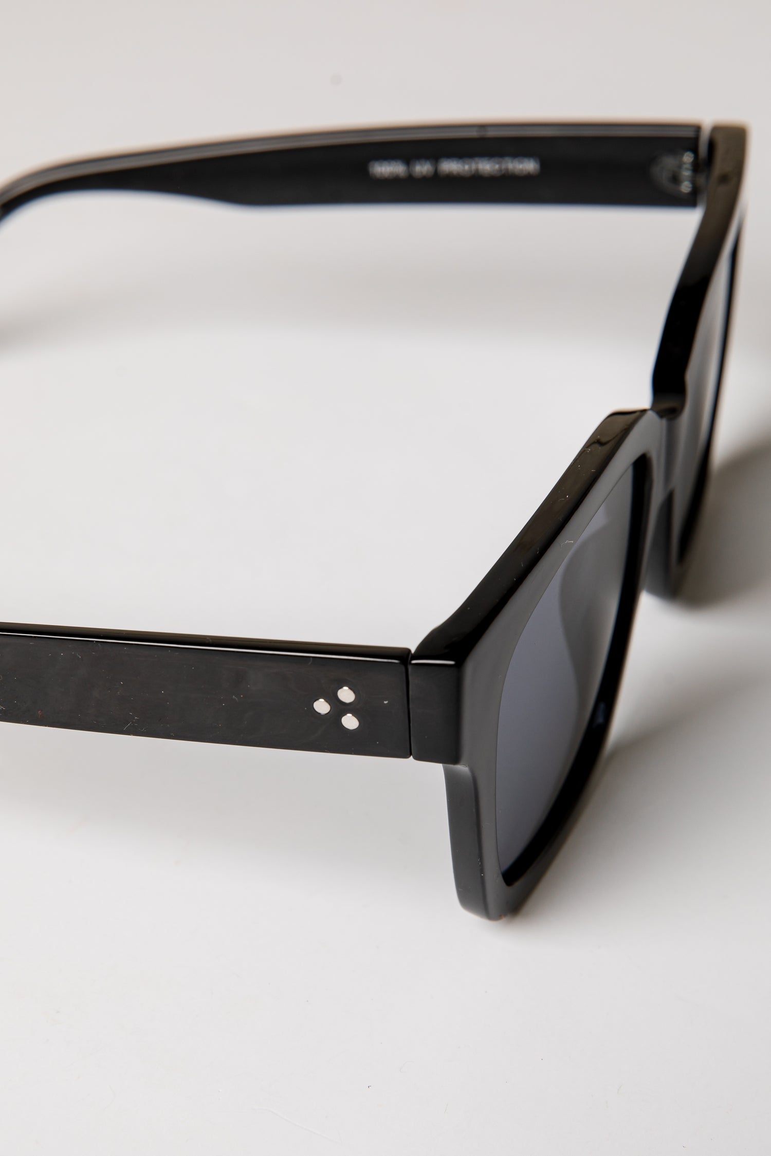 Black sunglasses on a white background