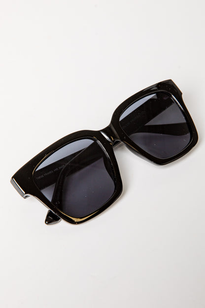 Black sunglasses on a white background