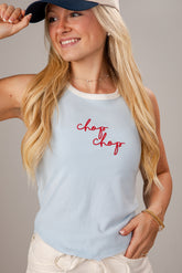 Woman wearing a light blue tank top with &