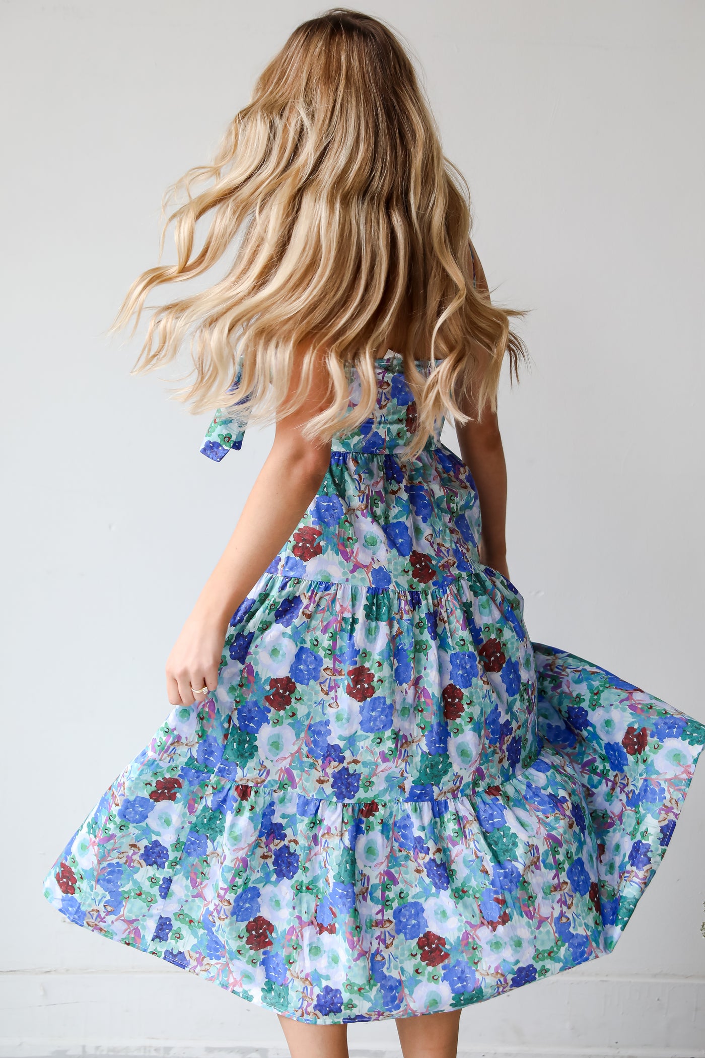 Blue Floral Tiered Midi Dress on model