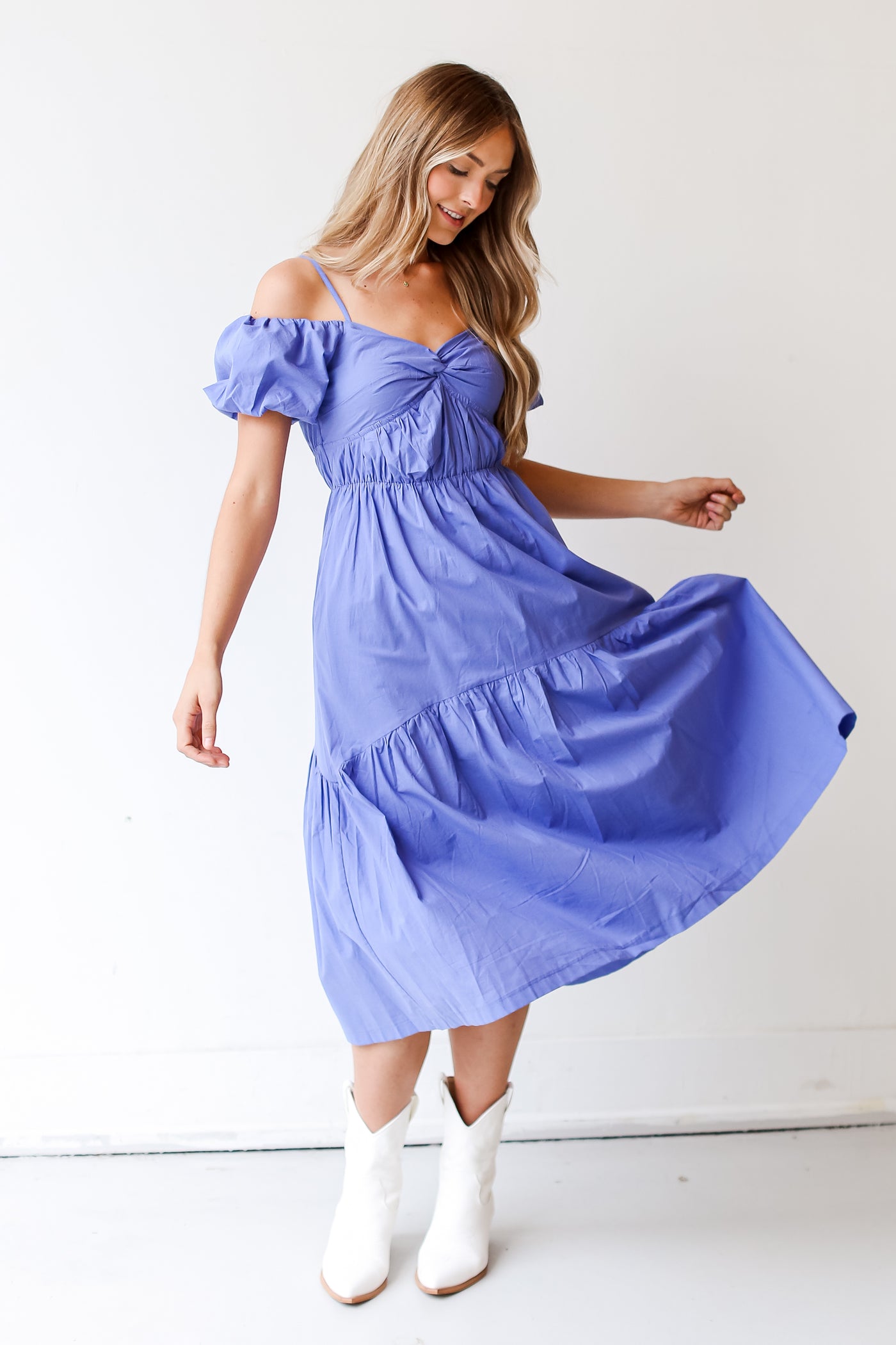 model wearing a blue Midi Dress