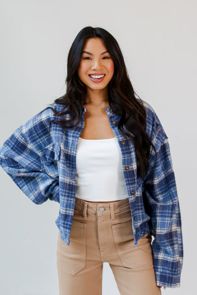 model wearing a blue plaid Cropped Shacket