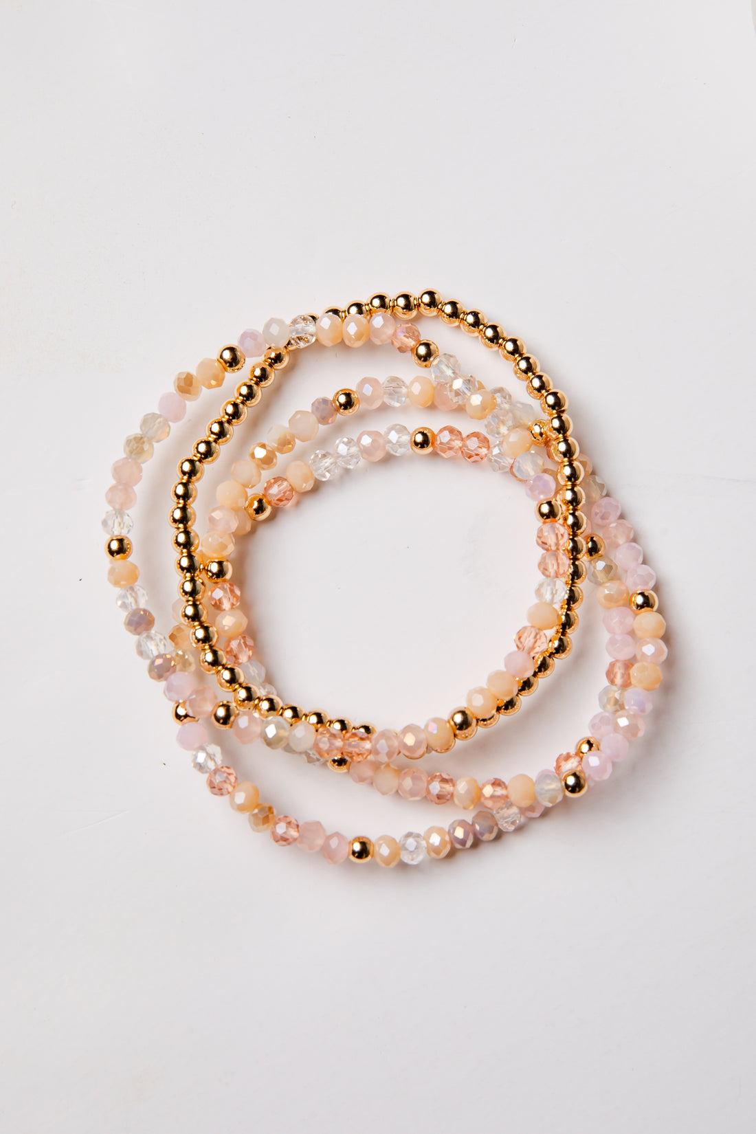 set of 4 gold and colorful beaded bracelets