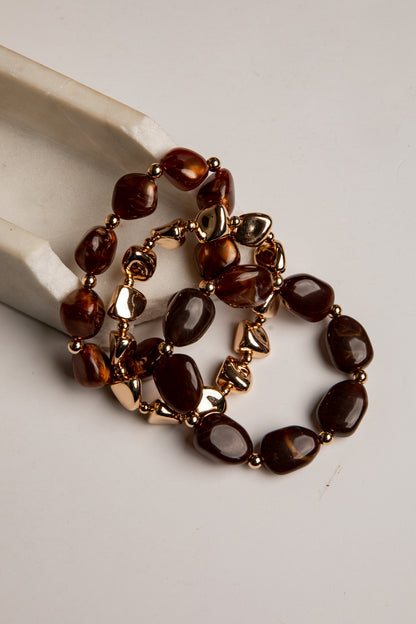 A beaded statement necklace with polished dark brown tiger&