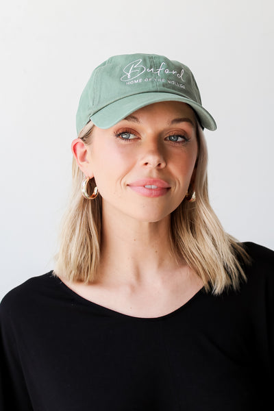 Green Buford Home Of The Wolves Embroidered Hat on model