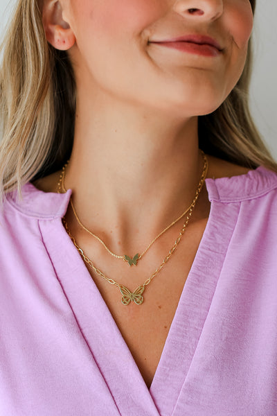 Gold Butterfly Layered Chain Necklace on model