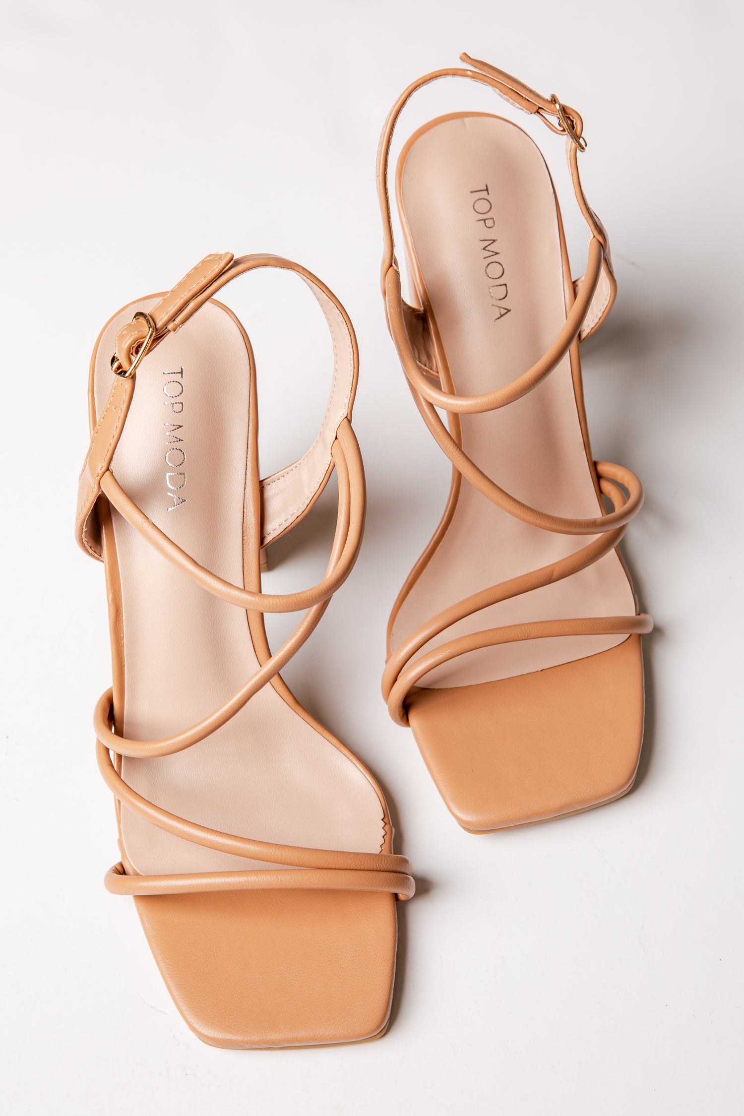 Pair of tan high-heeled sandals with &