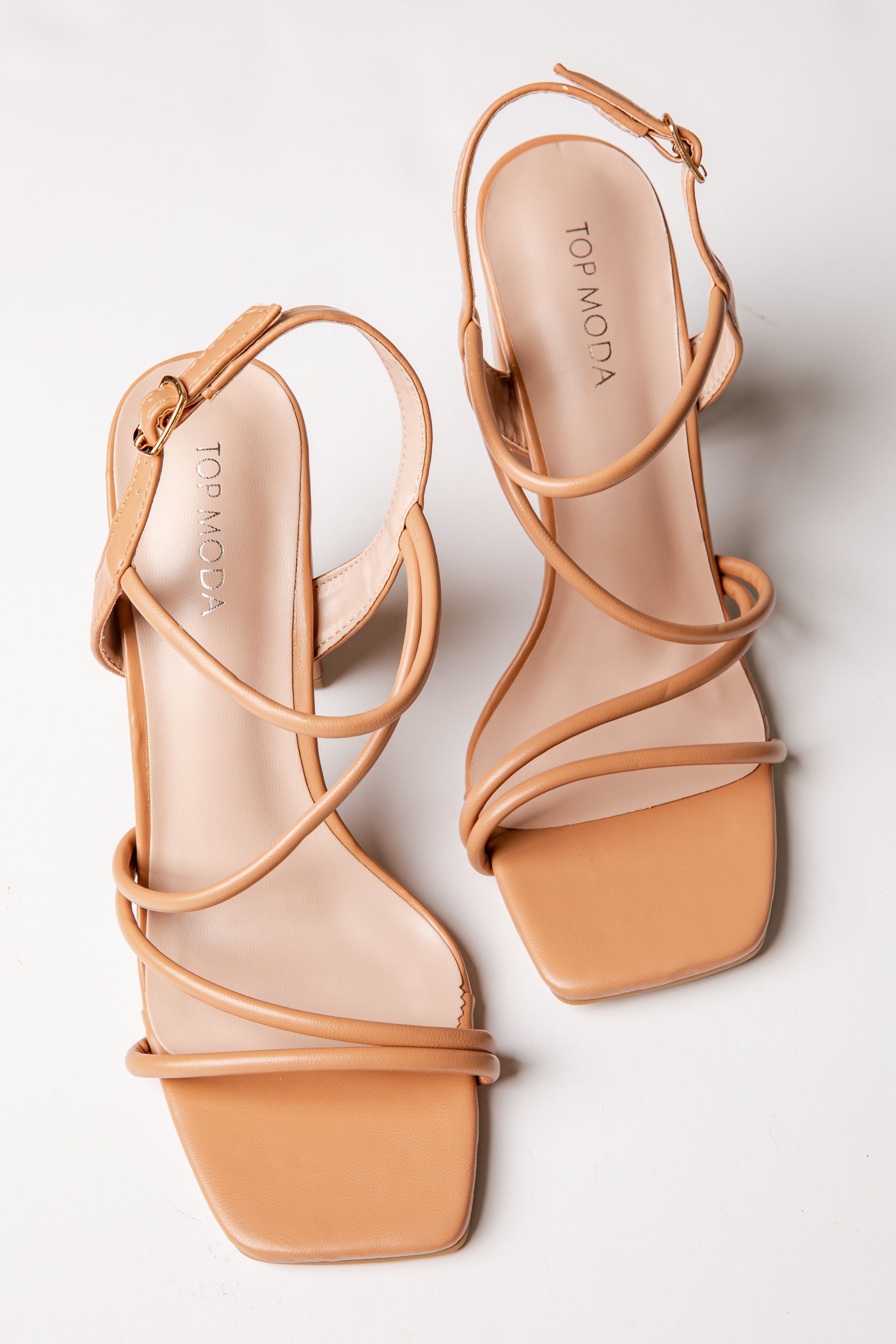 Pair of tan high-heeled sandals with &