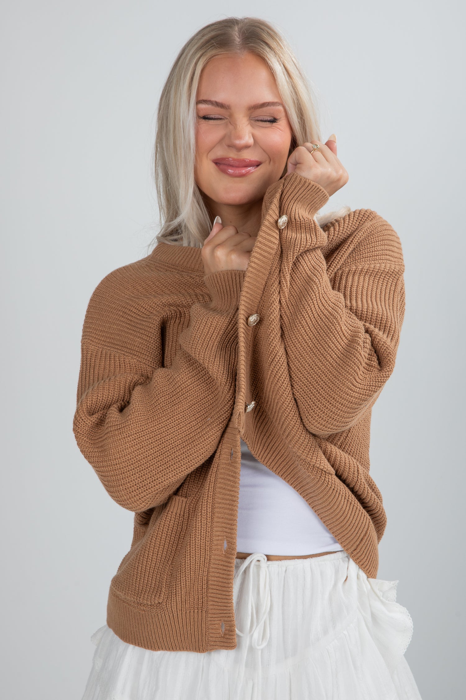 tan sweater