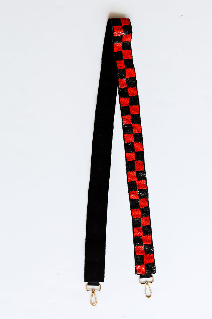 Red + Black Checkered Beaded Purse Strap flat lay