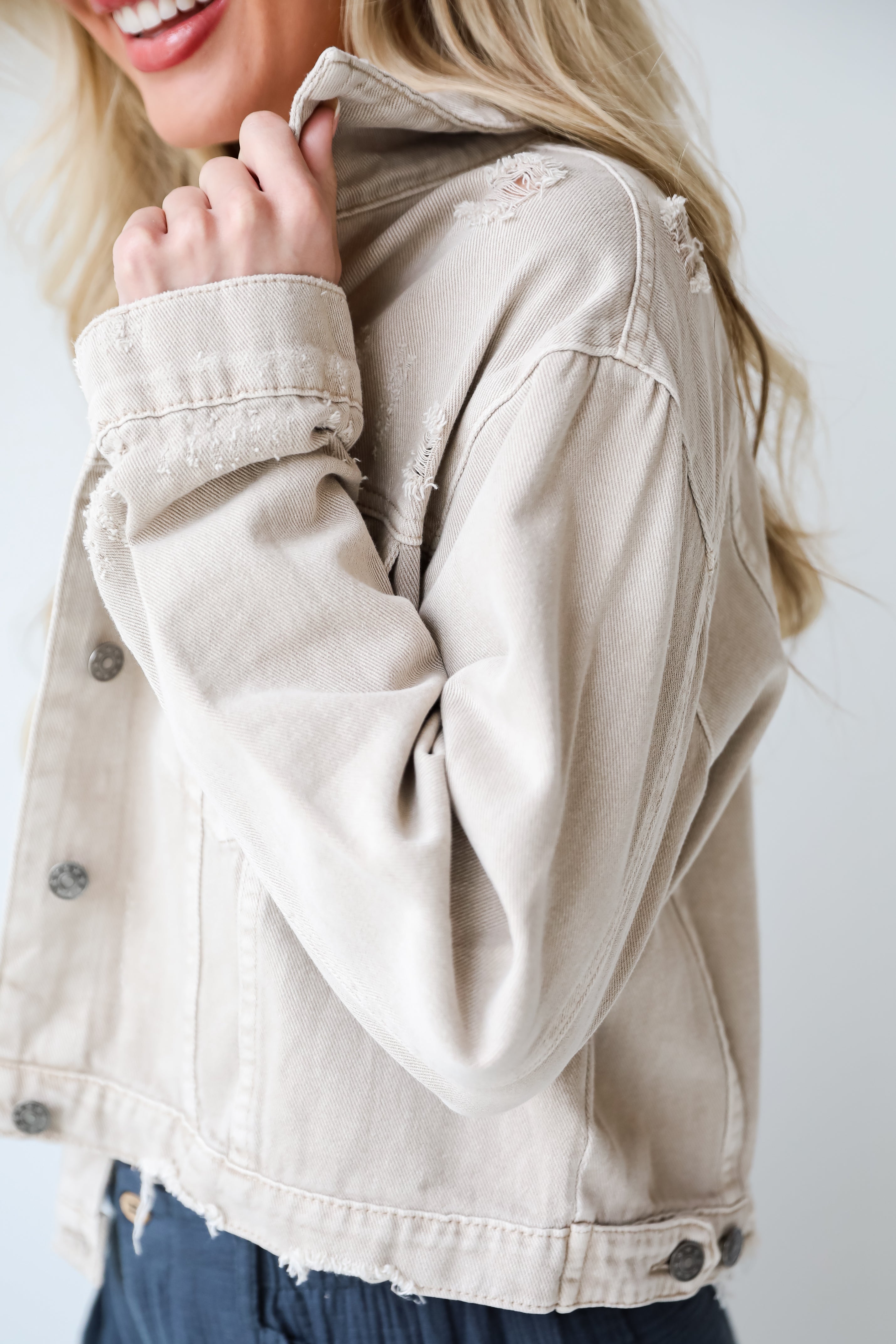 trendy jackets Definite Icon Taupe Distressed Cropped Denim Jacket is lighweight, mid-crop fit, and the perfect spring layer. Taupe jacket. spring jacket.