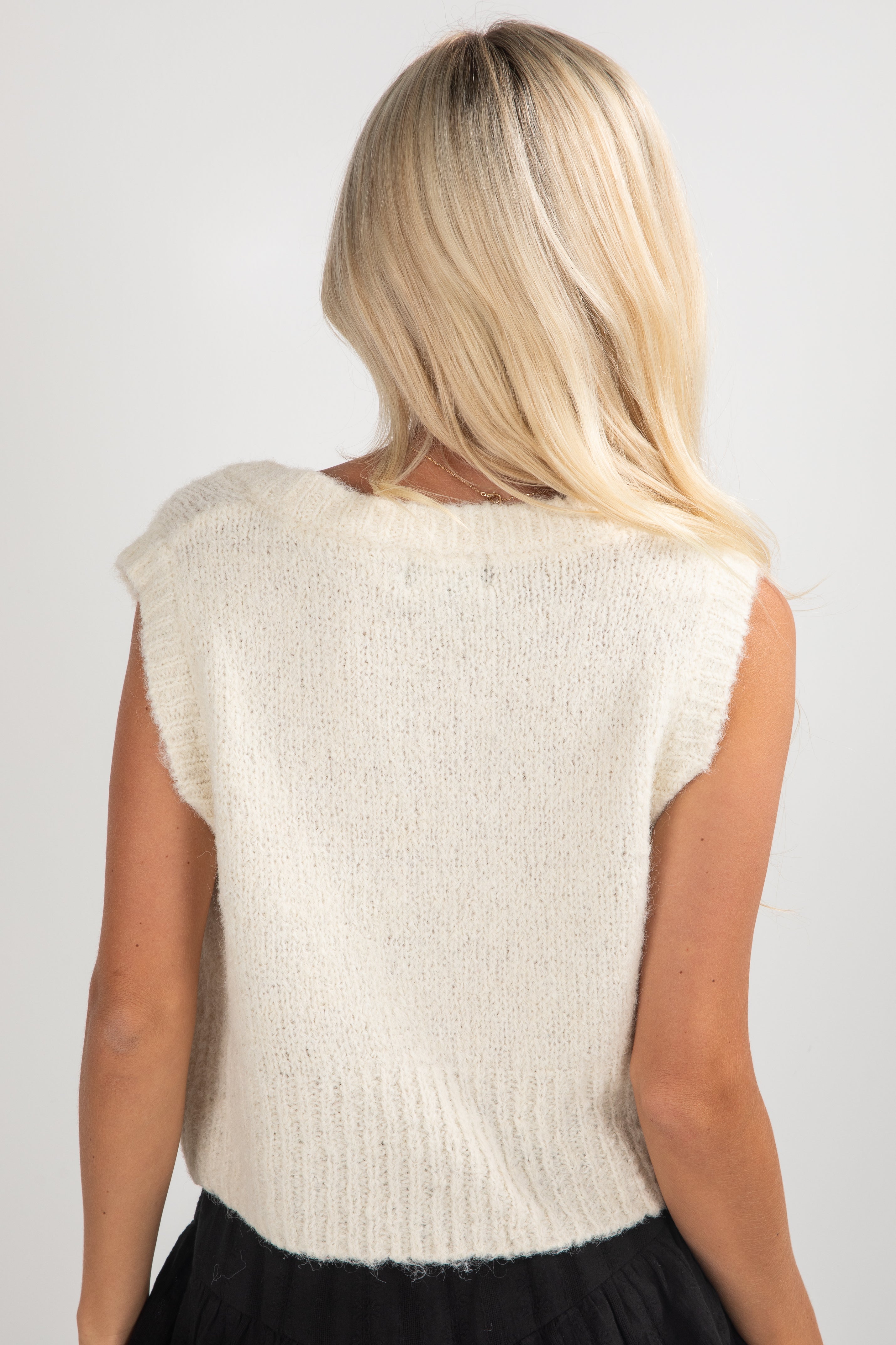 sleeveless sweater