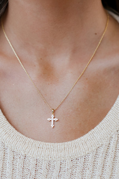 Gold Rhinestone Cross Charm Necklace on model