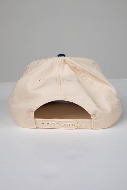 Beige baseball cap on a light gray background