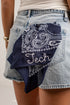 A navy blue bandana with a white paisley pattern and the word &