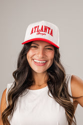 Woman wearing a white and red &