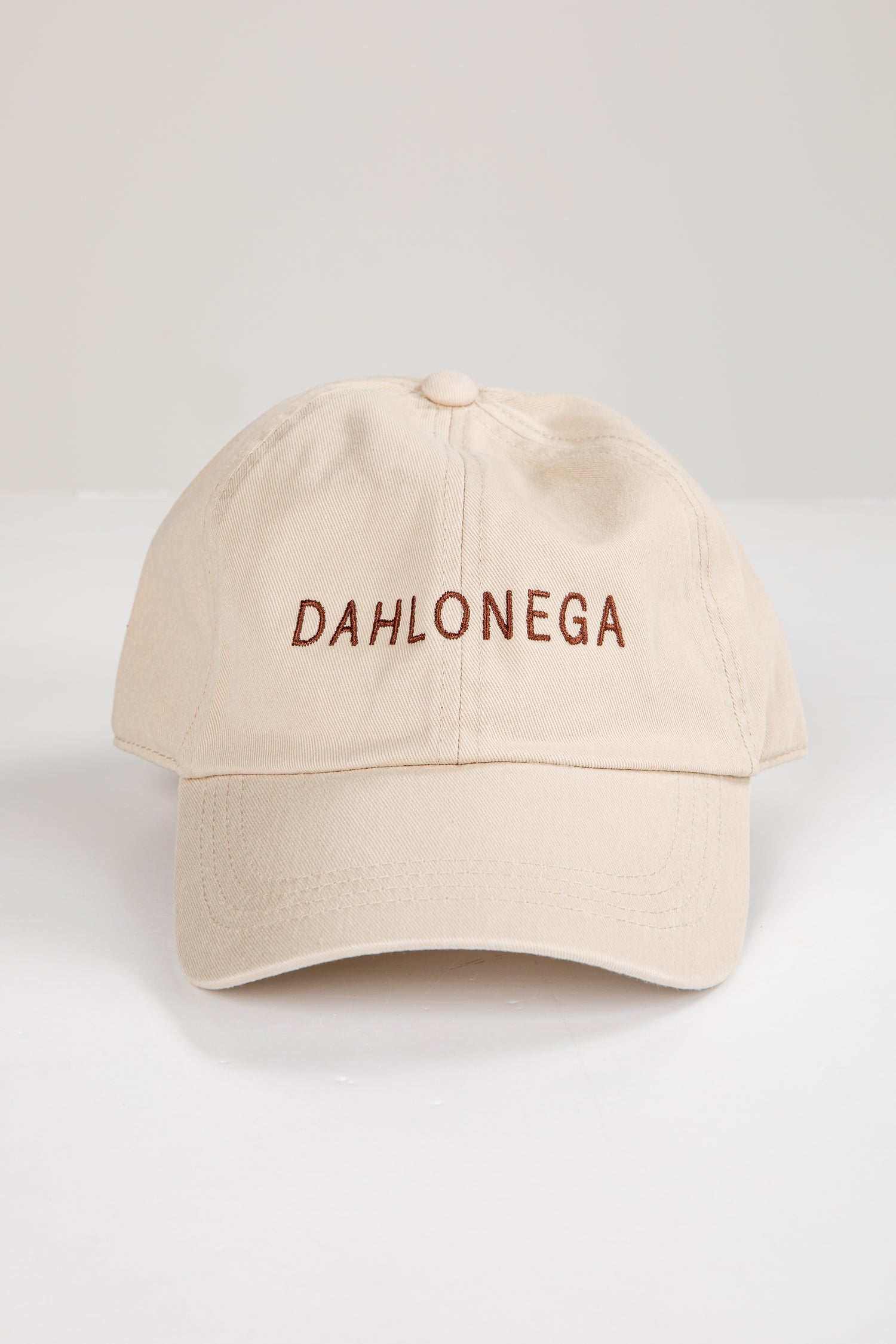 Beige cap with &