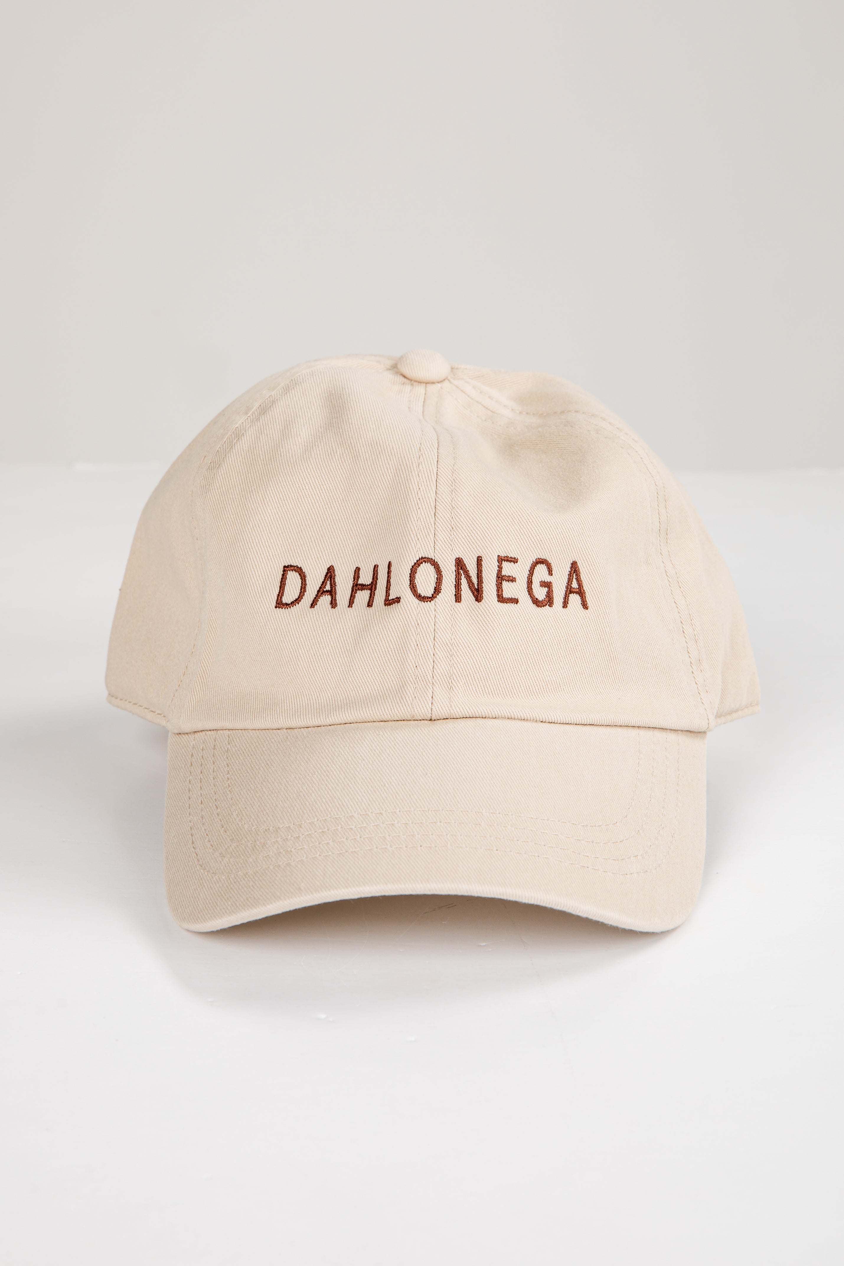 Beige cap with &