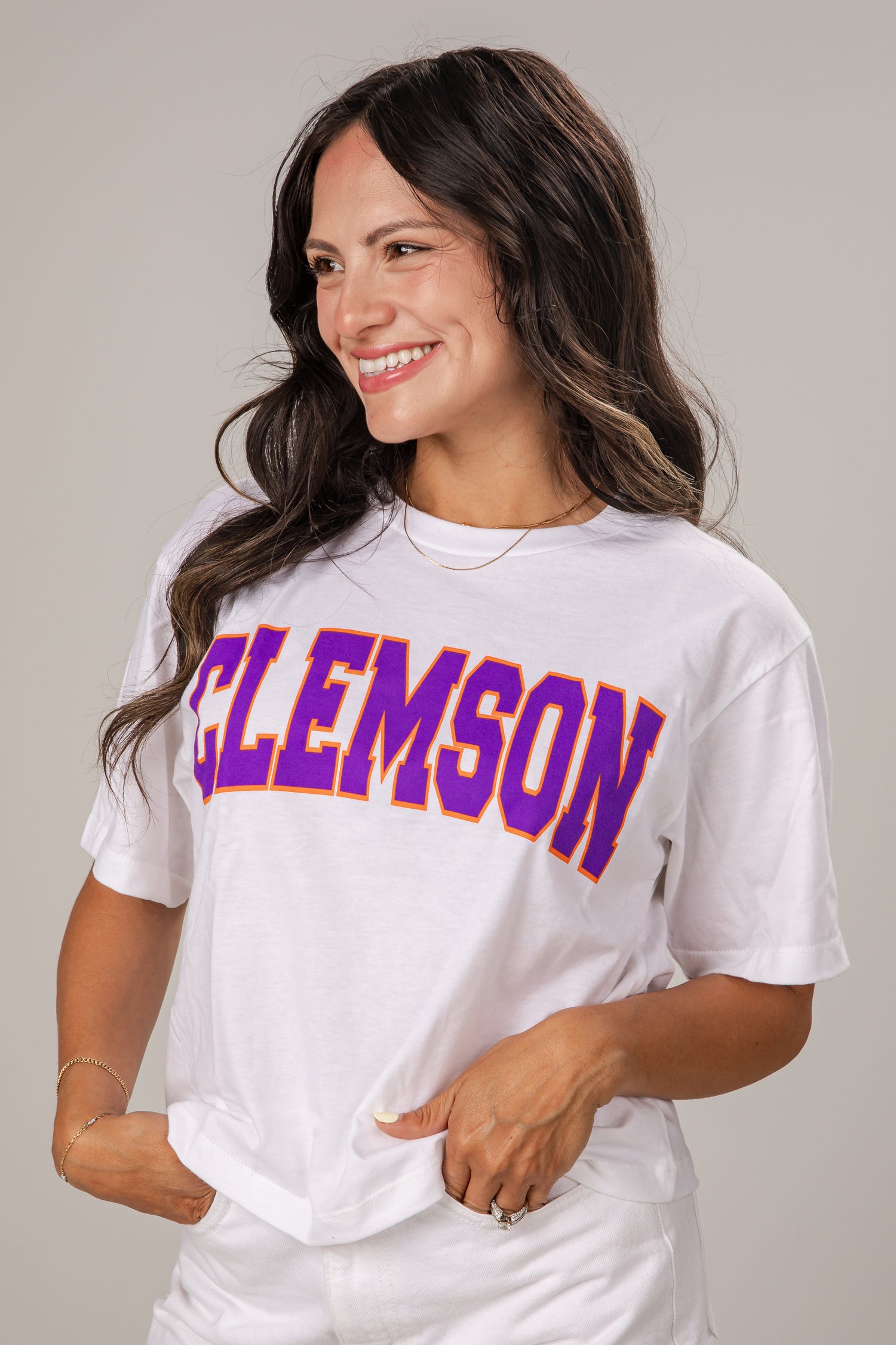 Woman wearing a white t-shirt with &