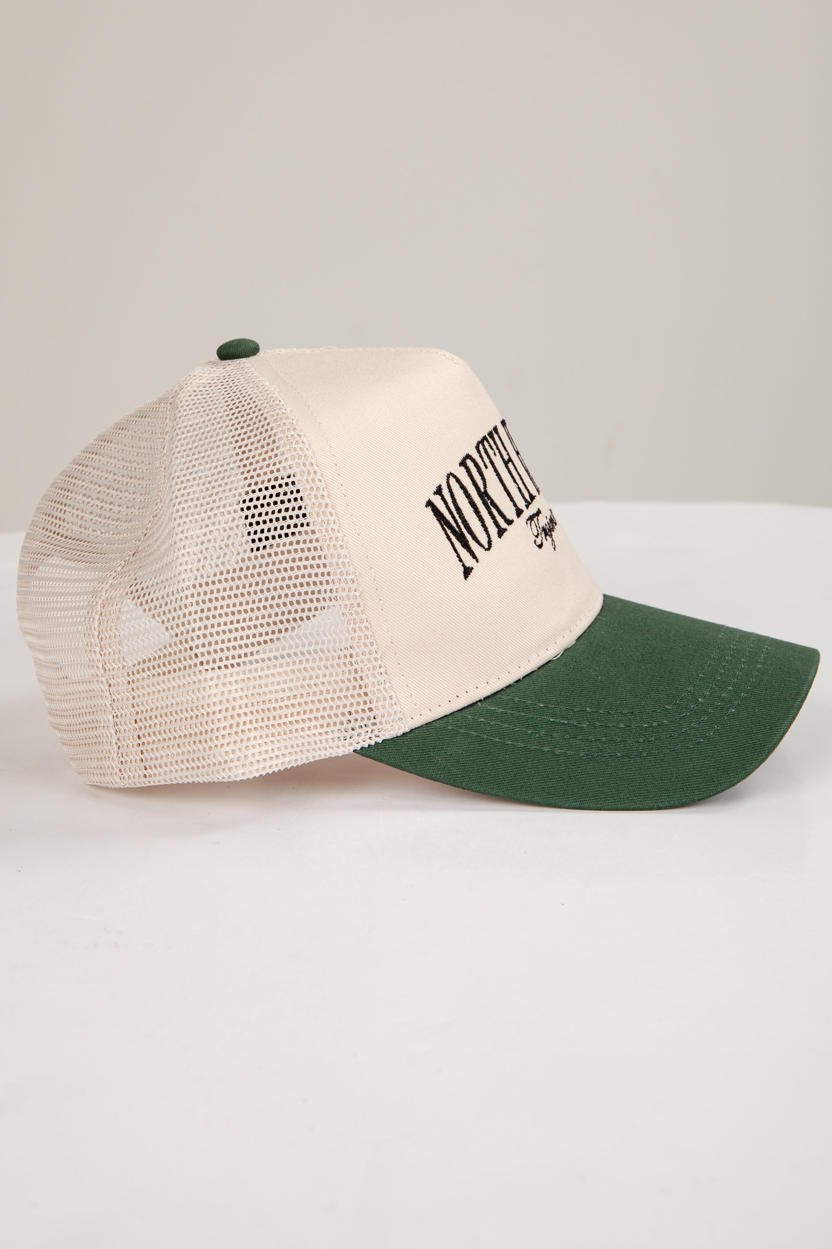 Beige and green trucker cap with &