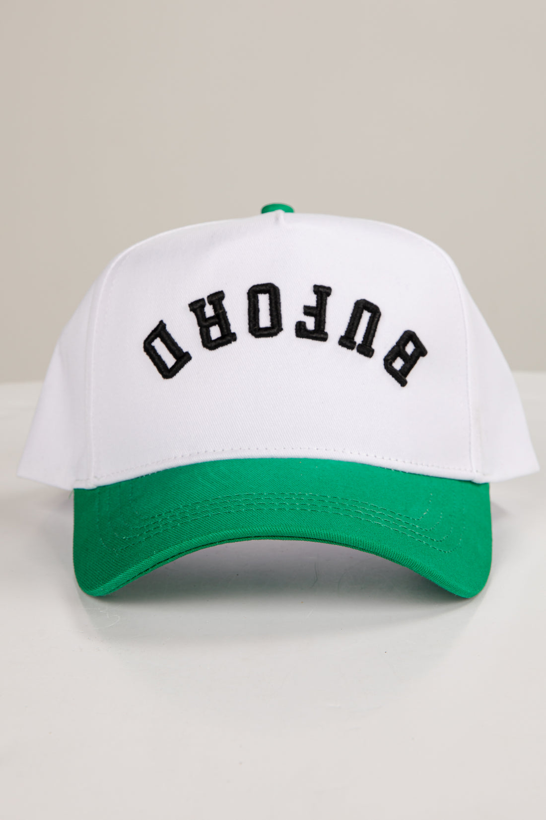 White and green cap with &