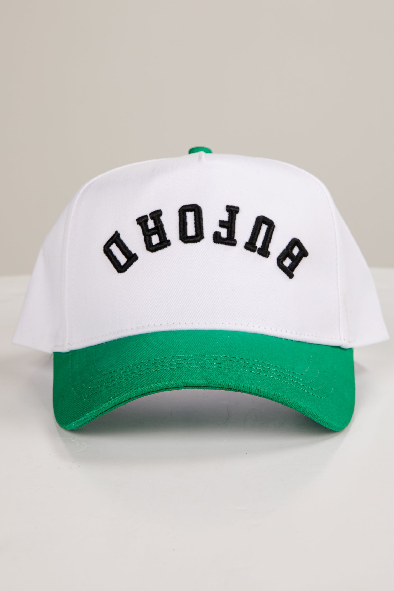 White and green cap with &