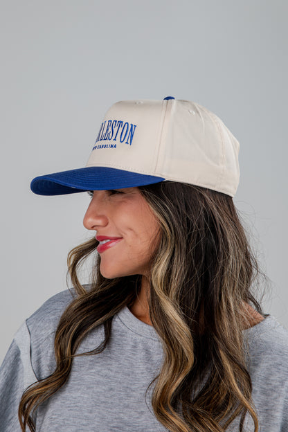 Woman wearing a cap with &