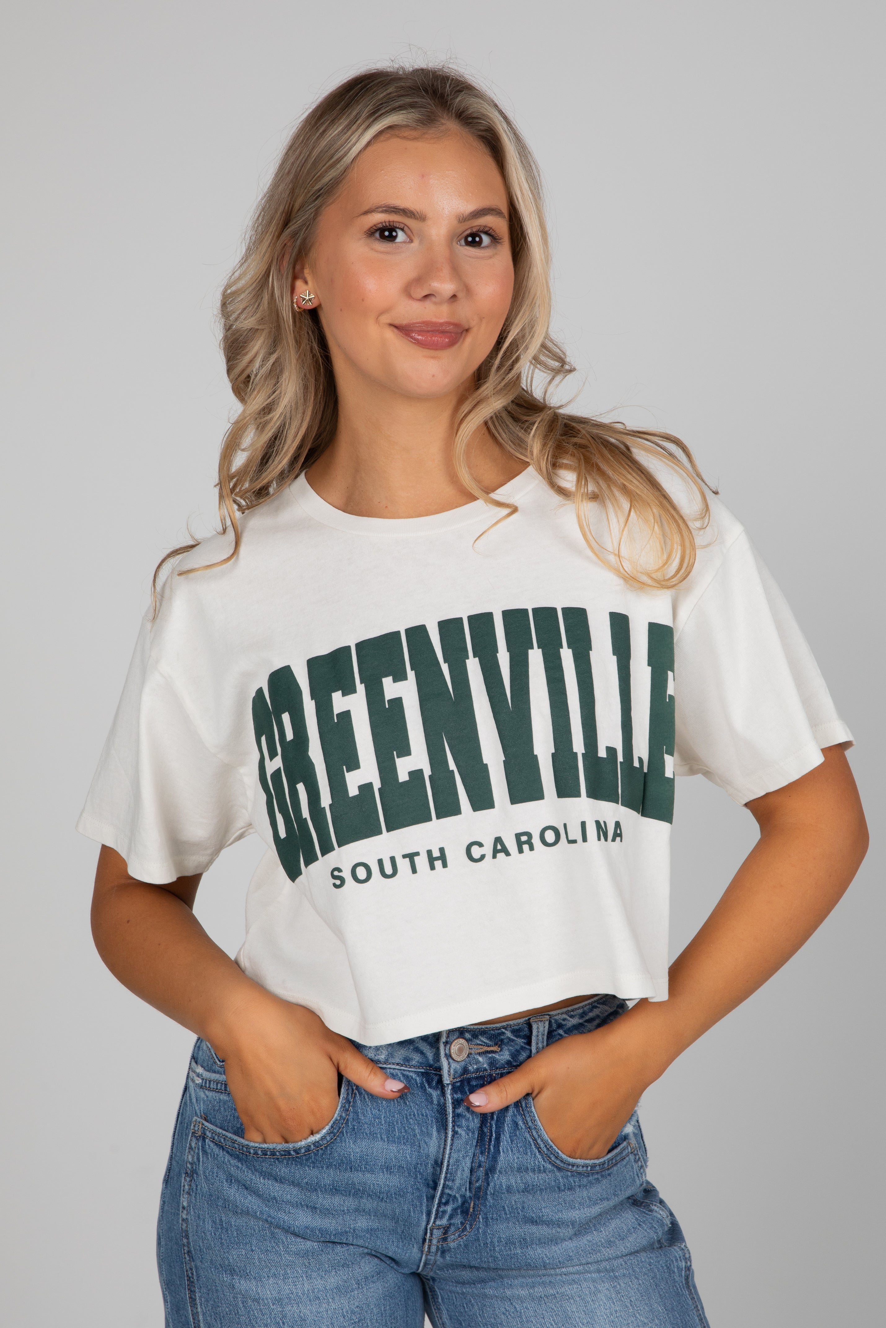 Woman wearing a white t-shirt with &