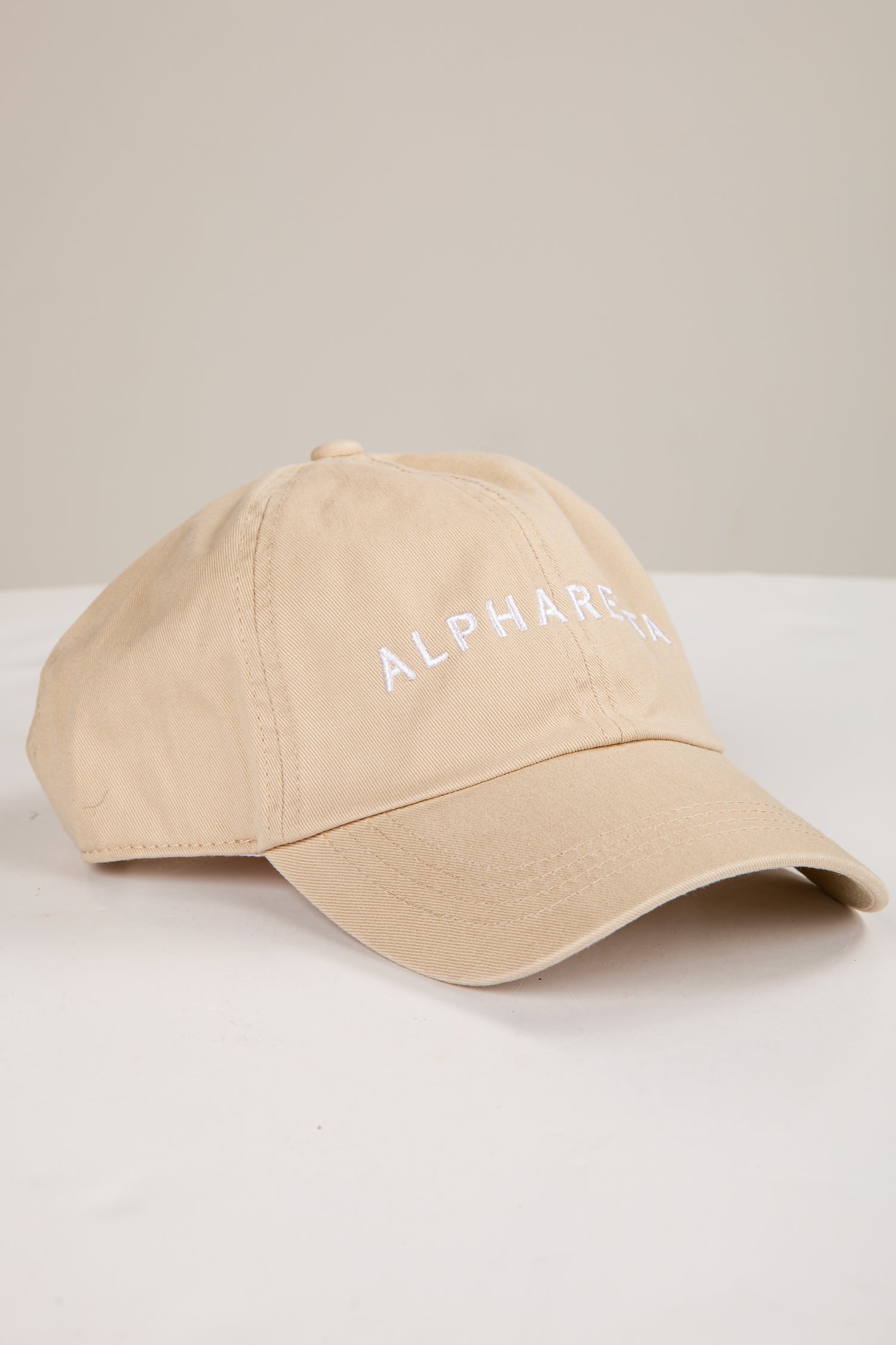 Beige cap with &